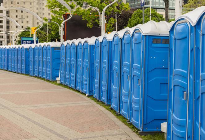 hygienic portable restrooms lined up at a beach party, ensuring guests have access to the necessary facilities while enjoying the sun and sand in Saddle Brook NJ